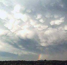 Clouds ove mountain near Blacksburg with rainbow